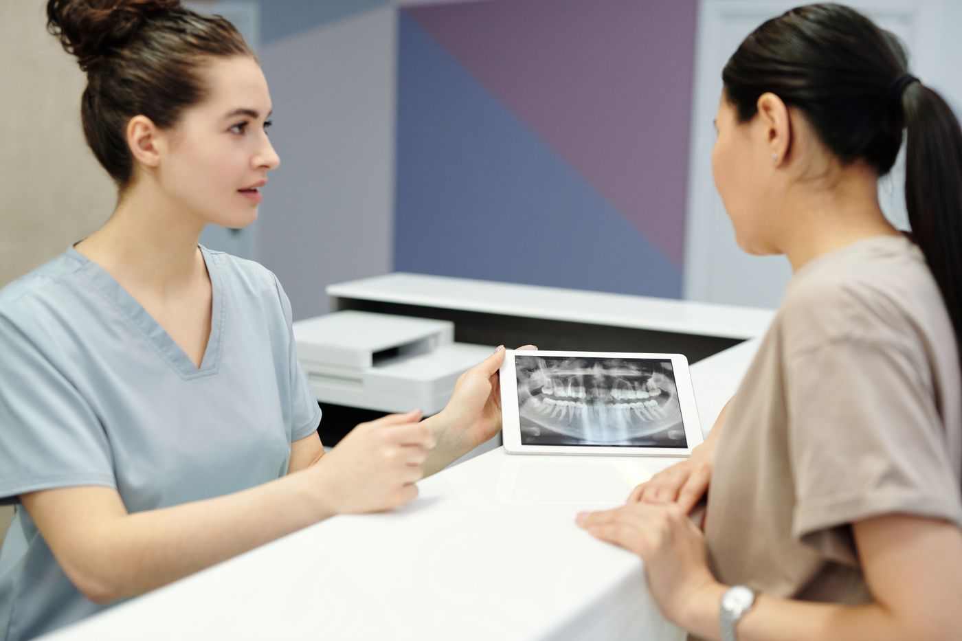 Treatment plan — printed estimate being handed over